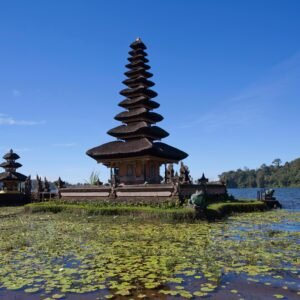 Captivating view of Ulun Danu Beratan Temple floating on a calm lake in Bali, Indonesia.